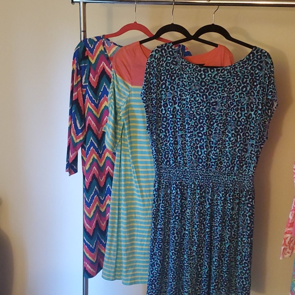 Woman's clothes three Lilly Pulitzer dresses.